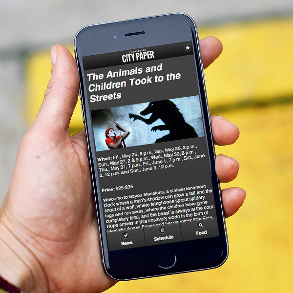 Hand holding phone with application running